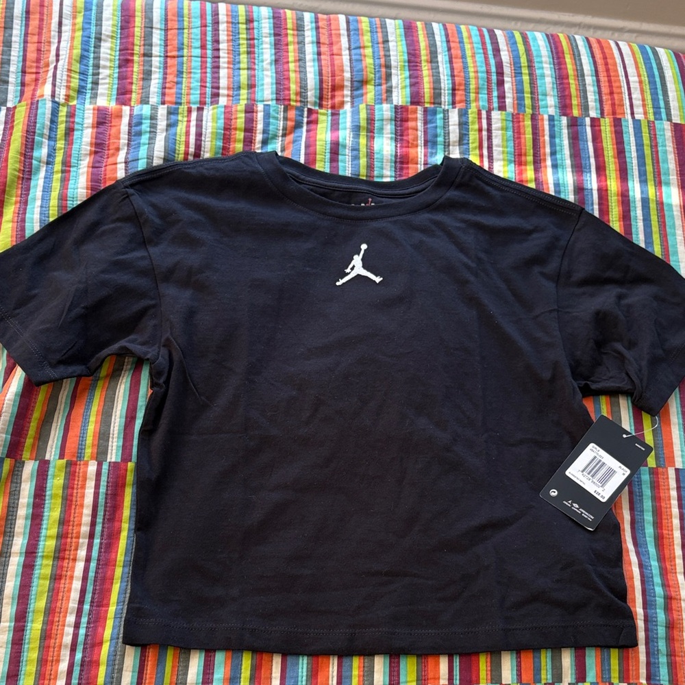 Jordan girls size medium  10-12 yrs. Black Tee with White Logo nwt